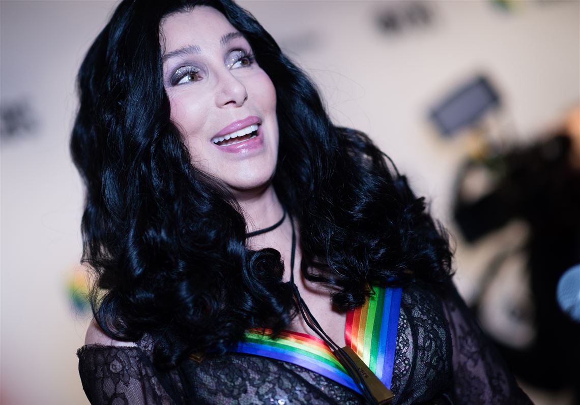 Cher wearing rainbow motif