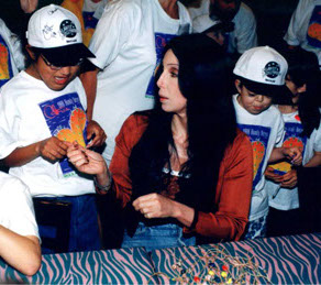 Cher with children from the Children's Craniofacial Association